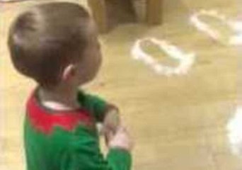 Little Boy Finds Santa's Footprints on Christmas Morning