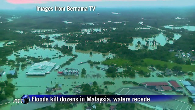 Floods kill dozens in Malaysia, waters recede
