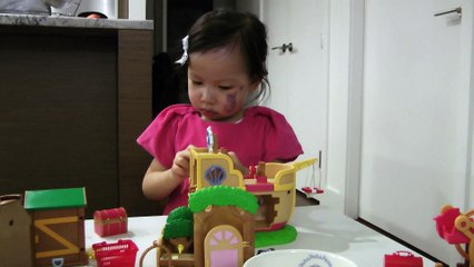 Girl And Sylvanian Families