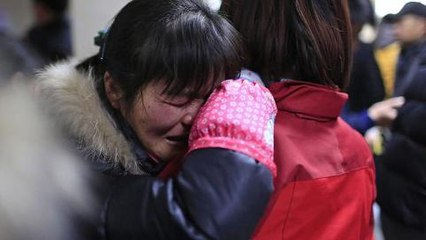 Shanghai New Year's stampede kills dozens