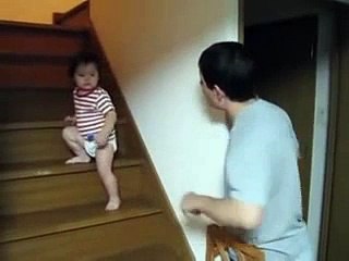 A Baby Kid Fight in his own way with his Father