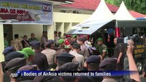 Bodies of AirAsia victims returned to families
