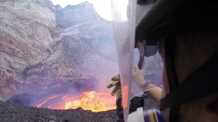 cameraman’s lucky escape after being hit by lava at volcano