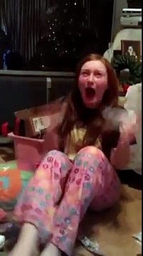When a girl receives the best gift ever : One Direction tickets! Crazy reaction!