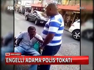 Tekerlekli sandalyedeki engelli adama tokat atan polis görevden alındı
