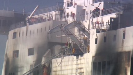 Fires still burn on stricken ferry, hampering investigation