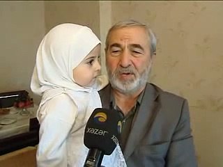 CUTE BABY RECITING HOLY QURAN