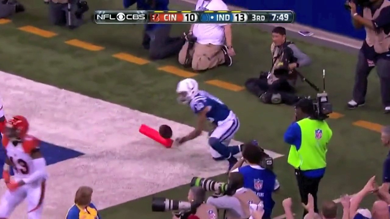 Andrew Luck, Colts defeat Bengals in AFC wild-card round