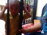 Dumb kid has his head stuck between 2 bars and his father will find the solution to help him!