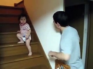 A Baby Kid Fight in his own way with his Father