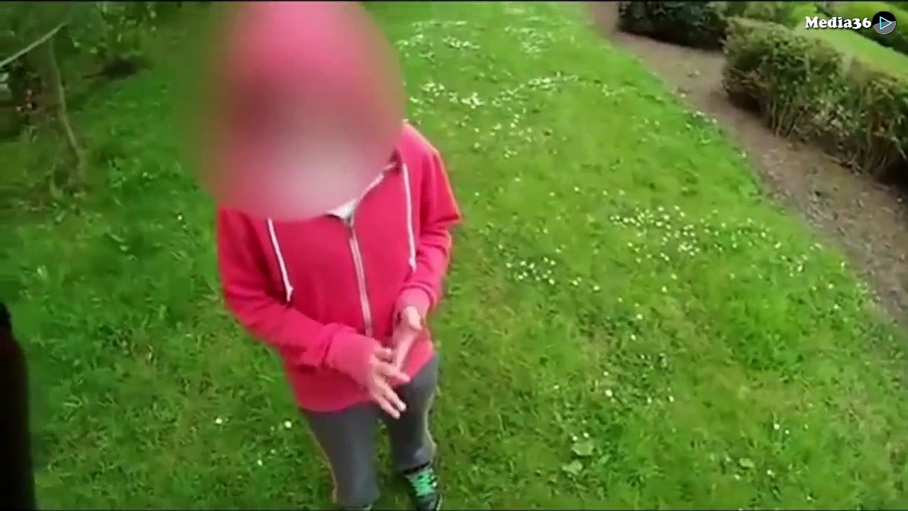 Motorcyclist gives child stern talking to for throwing stones