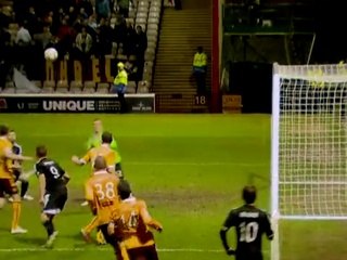 Rooney wraps up victory for Dons