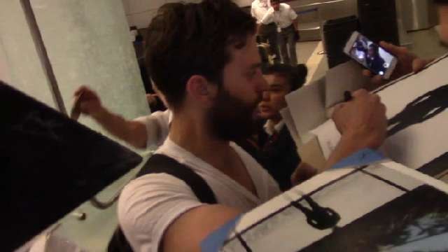 Jamie Dornan Gets Mobbed at LAX