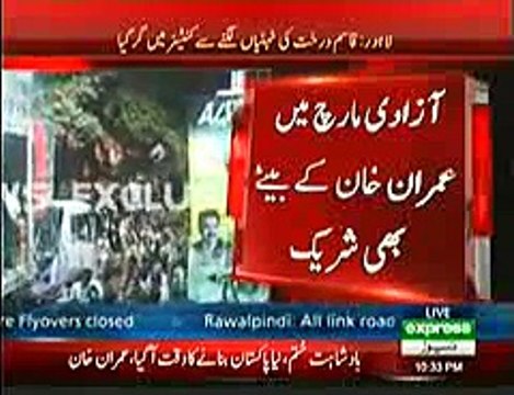 Imran Khan’s Son Qasim Who Is Participating In Azadi March Fell Down In Container Because Of Tree