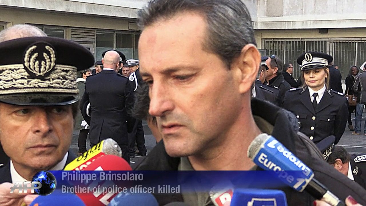Mourning and manhunt after Paris magazine massacre
