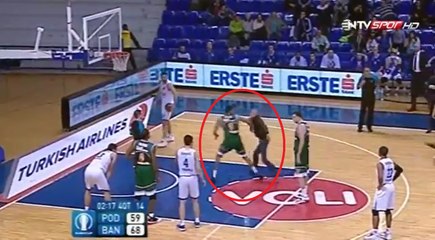 Basketballer takes down court invader with brutal WWE move