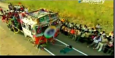 Girl tugging Huge Truck by her Hair - Powerful Hair of Girl