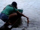 Dangerous way to fish Piranhas in Brazil : crazy but courageous girl!