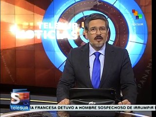 España: voluntarios atiendes a niños en riesgo de exclusión social