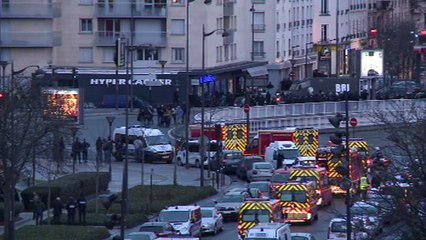 Charlie Hebdo suspects killed as twin sieges shake France