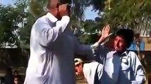 Pakistani School Teacher Beating his Students 2015 video