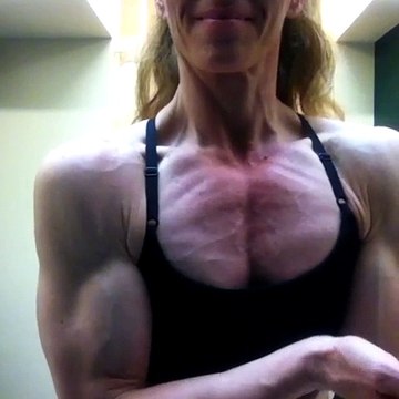 Shredded, vascular pecs posing