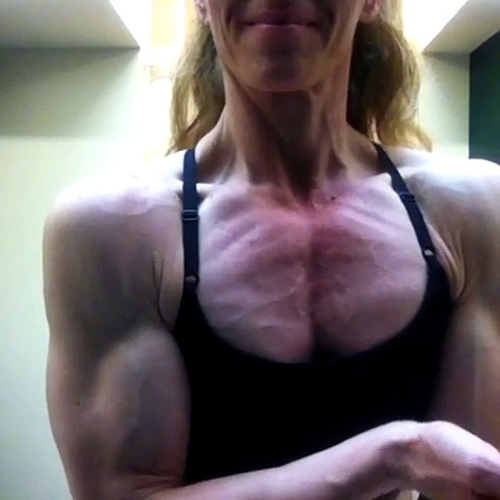 Shredded, vascular pecs posing