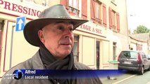 French town, scene of showdown, tries to resume normal life