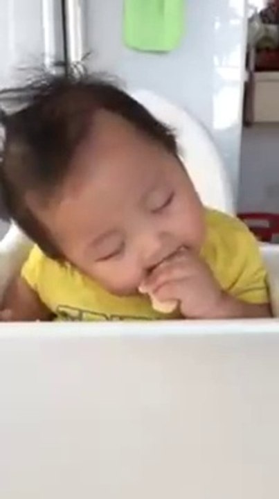 Funny sleepy baby- eating and sleeping!