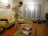 new born twins baby dancing with father