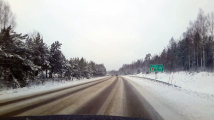 Drive to Uppsala via E4 (motorway) on snowy weather