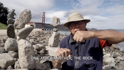 Rock Balancing - A guy defies gravity by balancing rocks