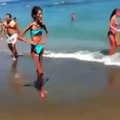 Girl Dancing On Beach