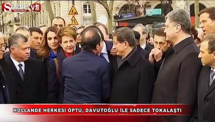 Hollande herkesi öptü, Davutoğlu ile sadece tokalaştı
