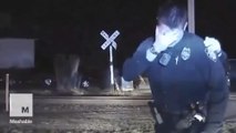 Video shows police officer crying on his car after shooting unarmed man