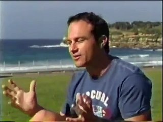 Michael Slater kisses the badge
