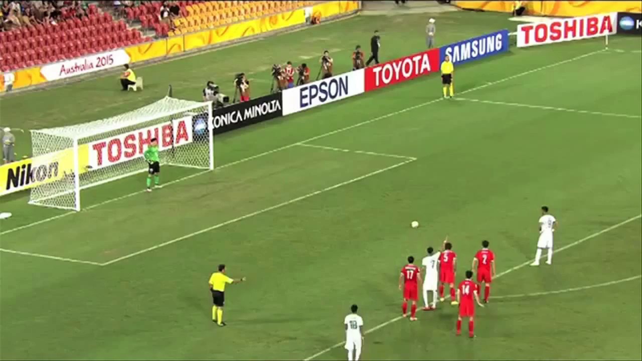 12-year-old ball-boy helps China goal keeper save a penalty