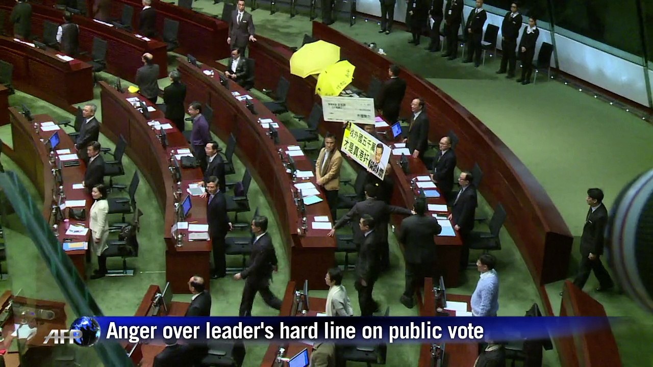 Hong Kong leader takes hard line on public vote in key speech