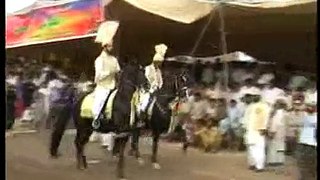 Hazrat Sultan Muhammad Ali Sahib and Ustaad Zaman Shah Sahib riding the most famous Horses Nageena (late) and Mastaana (2)