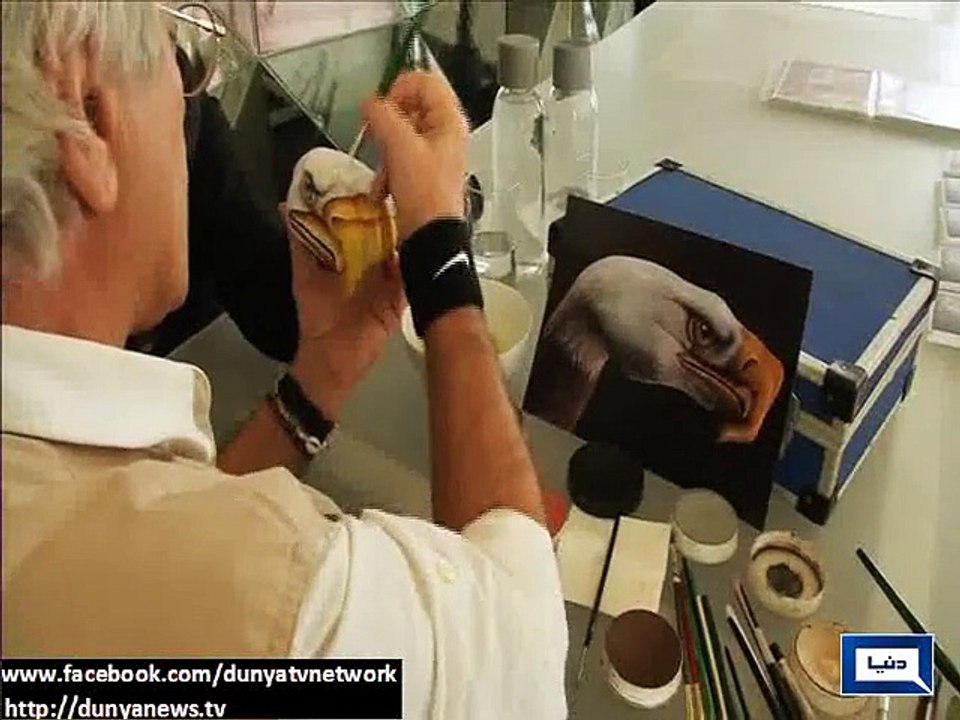 Man Paints Animals on Hands