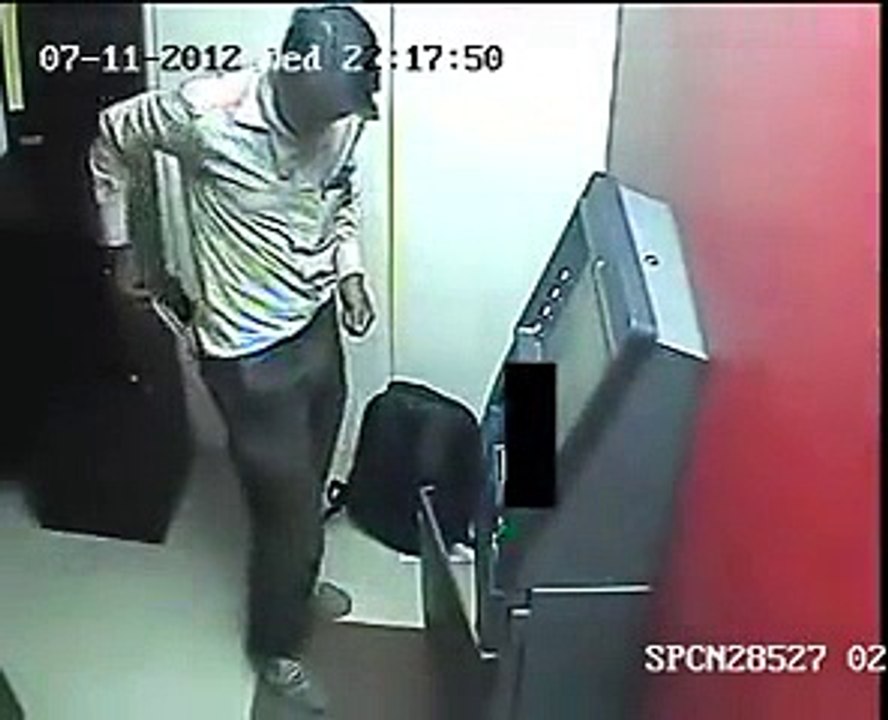 Check what this Guy is doing at ATM Machine.
