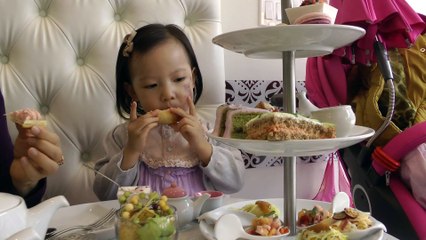 Girl Having Afternoon Tea