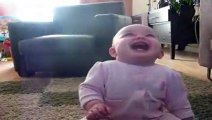 Baby Girl Laughing Hysterically at Dog Eating Popcorn