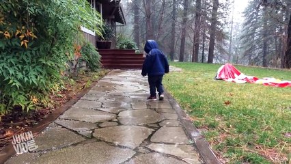 Little child falling in rain. is it due to gravity ?