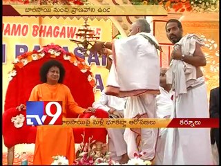 Bala Saibaba alleged for land grabbing