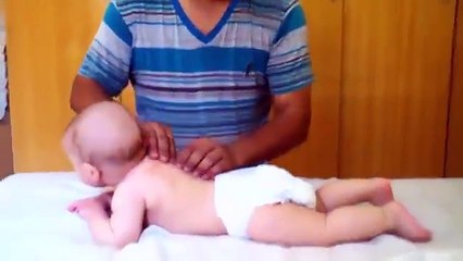 A Funny baby taking Massage Makes this Baby Smile