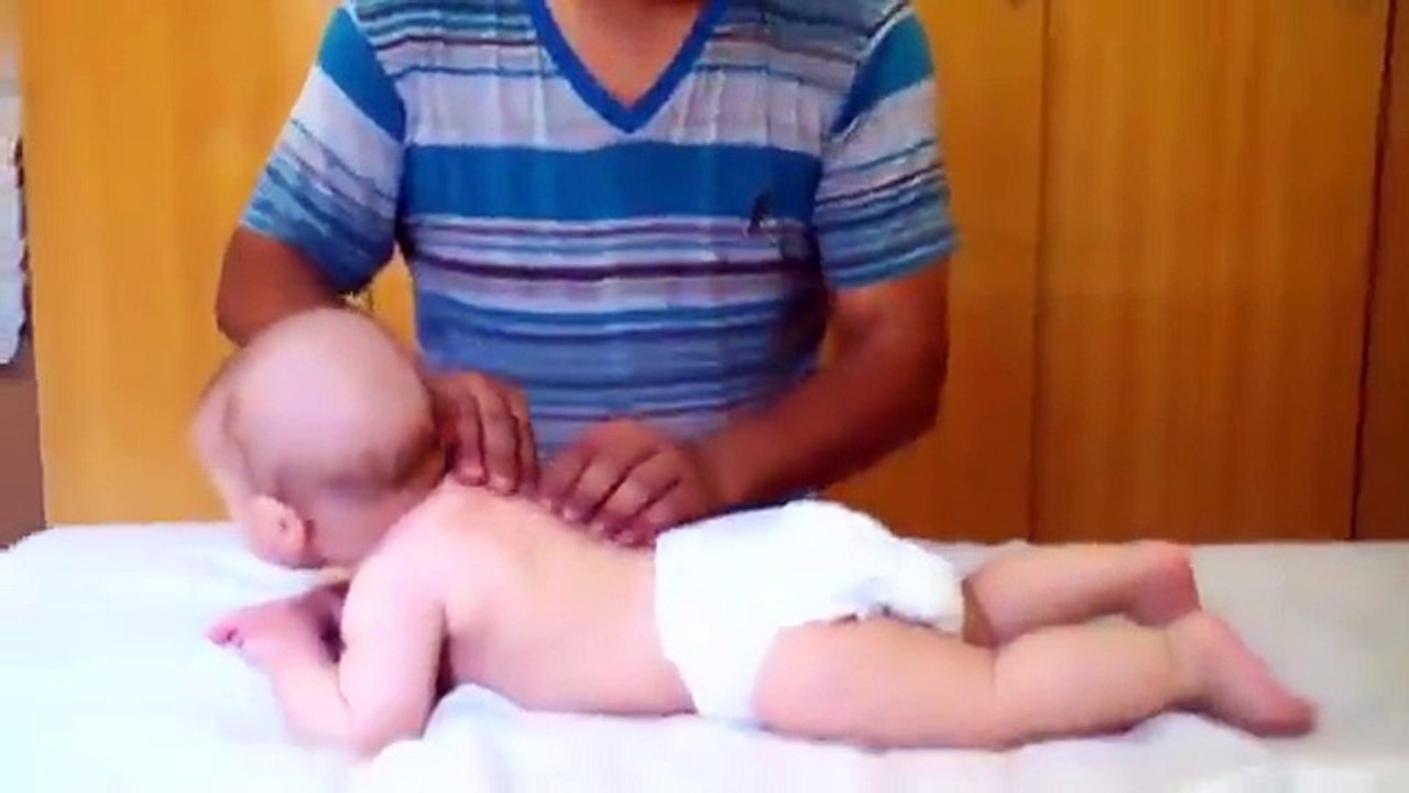 A Fun Massage Makes this Baby Smile