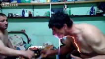 Russian guy sets his face on fire : Flaming Vodka Mishap