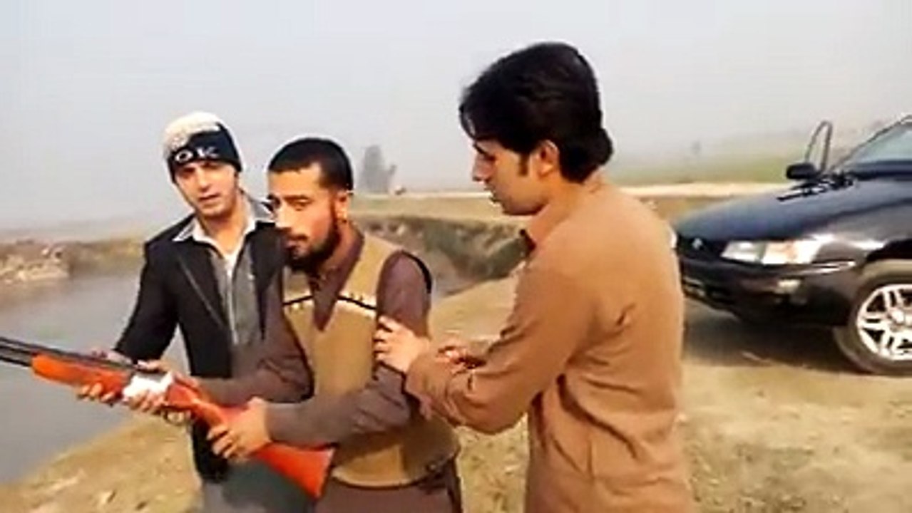 Reaction of boy when operating a gun