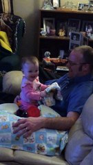 Cute Baby Playing Peek-a-Boo with her dad
